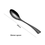 Luxury black 18/10 stainless steel cutlery set arranged on a table