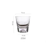 Transparent snow mountain whiskey glasses with Mount Fuji shape on a wooden table