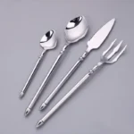 Elegant western dinnerware set with 4 pieces of 304 stainless steel spoon and fork on a table