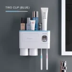 Dispenser in action, with a blob of toothpaste on the brush, ready for use.
