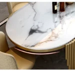 Modern oval marble dining table with gold stainless steel legs seating 6-8 people - Goldoma