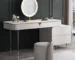 Goldoma modern vanity table with mirror and stool in a bright bedroom