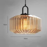 Modern colored glass pendant lamp illuminating a cozy dining room with vibrant hues