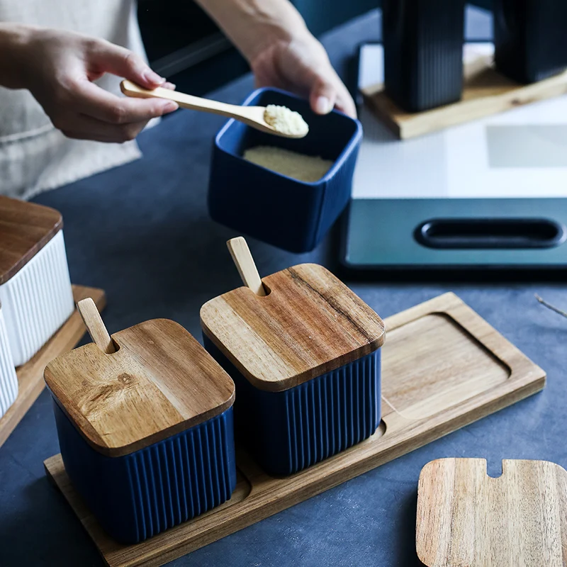 Saf4bfa04c2854d019a373604c989e049Y.webp Ceramic kitchen storage container set with matte striped design and spoon