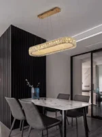 Luxury crystal chandelier illuminating a modern living room with sparkling light
