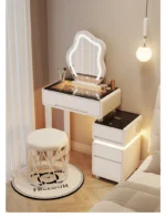 Luxury modern dressing table with mirror and stool in bedroom setting featuring compact vanity with drawers