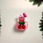 Side view of cherry pattern toothbrush holder showing ventilation slots and glossy finish.