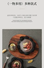 Volcanic stone sushi plate with fresh sushi rolls and wasabi on a dark textured surface