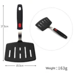 Goldoma high heat resistant spatula in use on a non-stick frying pan
