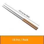 Stainless steel flatware set with wooden handles displayed on a table