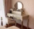Nordic style bedroom dresser with mirror and stool in a bright room