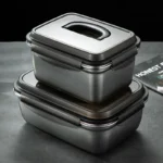 Large stainless steel food storage container with lid and handle for refrigerator organization