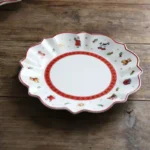 German Treasure Hard Porcelain Toy Joy Multi-Angle Dinner Plate Christmas Cup Saucer Bowl Candlestick – side view