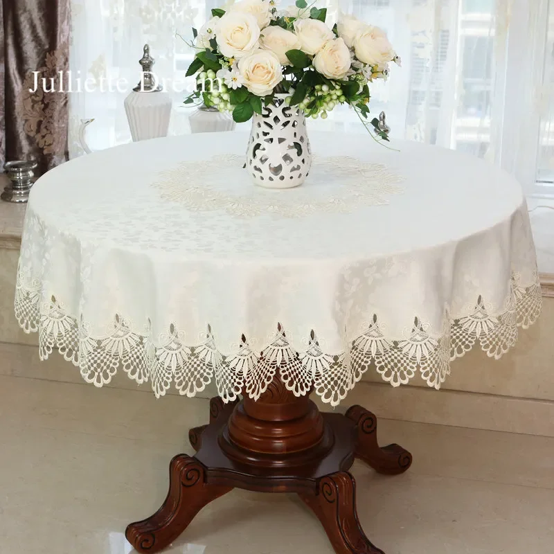 Sb593e533a2ea4b2a90eb83e301ddc42co-1.webp Elegant lace tablecloth with rose gold embroidery on a dining table