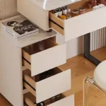 Modern Nordic vanity table with storage drawers and mirror in bedroom setting
