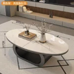 Modern coffee table with sintered stone top in black frame and bright fish belly white finish, rectangular shape