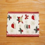 Red and green Christmas table runner with plaid pattern on dining table