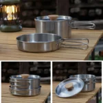 Stainless steel camping cookware set with pot, pan, and kettle on a campfire