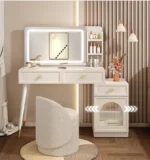 Modern makeup vanity with mirror and stool in a bedroom setting, featuring four drawers and sleek wooden design – Goldoma