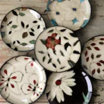 Ceramic dinnerware set with Japanese flat serving plates in floral Nordic design