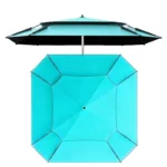 Large beach umbrella with octagonal canopy providing shade on a sunny beach