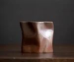 Japanese simple stoneware coffee cup on wooden table
