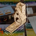 CZYY dice tower in use during a tabletop game, dice rolling down the ramp into the tray.