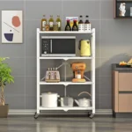 Foldable kitchen shelf with multilayer iron frame in a modern kitchen displaying dishes and spices