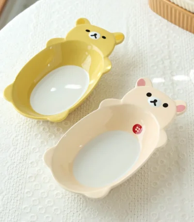 Cute fruit plate with Rilakkuma character in kawaii style on a ceramic plate with fruit slices