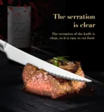 Elegant gold flatware set with steak knife, fork, and spoon on a dark table