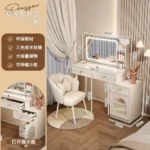 Modern makeup vanity with mirror and stool in a bedroom setting, featuring four drawers and sleek wooden design – Goldoma