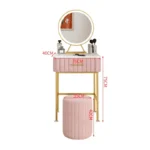 Marble top dressing table with lighted mirror and stool in a bedroom setting