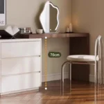 Modern vanity table with mirror and drawers in a bedroom setting