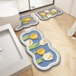 Modern absorbent bathroom floor mat set with floral design in a bathroom