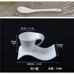 White porcelain espresso cup with wavy design on saucer, modern home decor