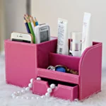 Close-up of brown leather PU multifunctional storage box with compartments for stationery.