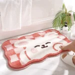 Non slip bathroom rug with frog and bear flocking design on bathroom floor