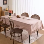 French country tablecloth with retro plaid pattern and lotus leaf edge on a dining table