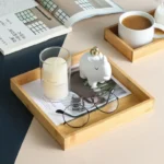 Elegant bamboo serving tray with Japanese-style square design, perfect for serving tea or fruit