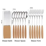Stainless steel flatware set with wooden handles displayed on a table