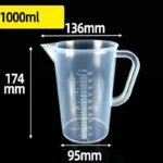 Transparent plastic lab beaker with measurement scale on kitchen counter