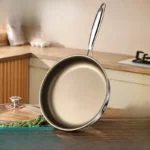 Goldoma titanium frying pan with nonstick surface on induction cooktop