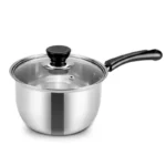Goldoma stainless steel milk pot with lid on a kitchen stove