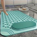 Oblong non-slip bath mat with suction cups on shower floor