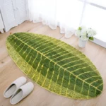 Soft absorbent bath mat in bathroom with banana leaf texture