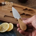 Acacia cheese board set with cheese knives and wooden cutting board on a table