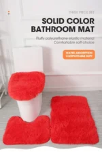 Plush bathroom rug set with toilet lid cover and mat in a cozy bathroom