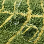 Soft absorbent bath mat in bathroom with banana leaf texture