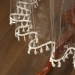 Elegant waterproof table cover with retro fringed lace on a dining table