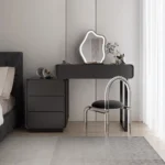 Modern makeup vanity table with mirror and storage drawer in bedroom setting